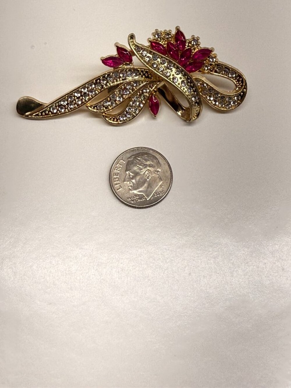 Vintage style Gold Brooch with red stones and rhinestones.